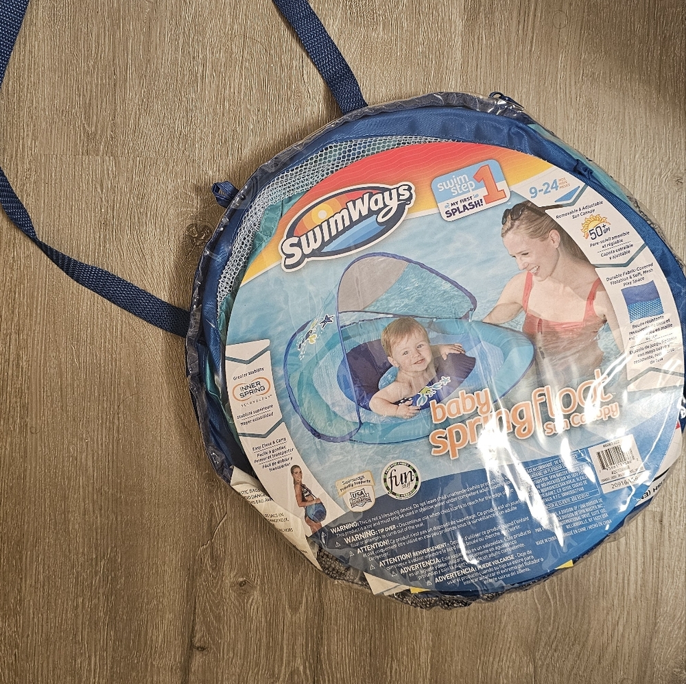 Swimways baby spring float with adjustable canopy and UPF Sun protection, Blue